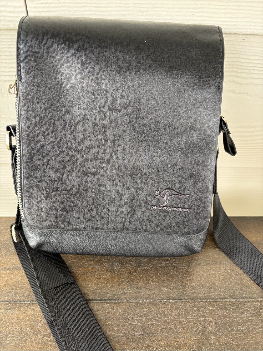 Kangaroo Kingdom black leather Bag with Adjustable Strap 7.5”x9”x2.5” EUC